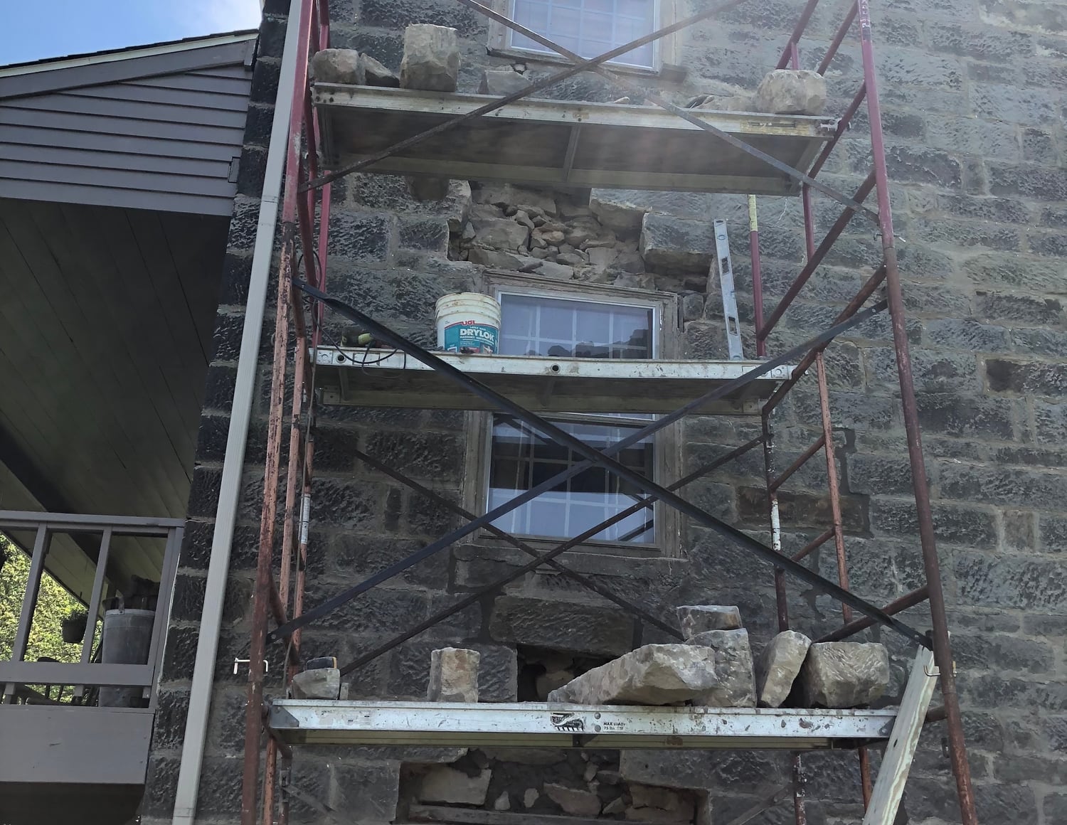Stone facade masonry on Cleveland's west side by Mason One